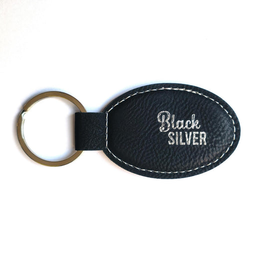 Black / Silver leatherette keychains - OVAL - Pack of 5